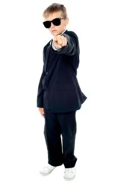 Small boy in blue suit pointing at you Stock Photos