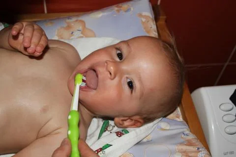 A small boy cleaning teeth. Stock Photos