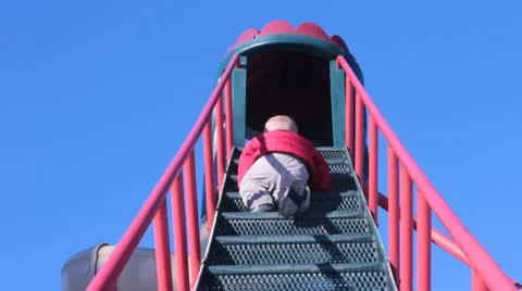 Small boy crawling or climbing park stairs. Video stock 20625144