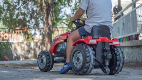 Small boy with his tractor Stock Photos