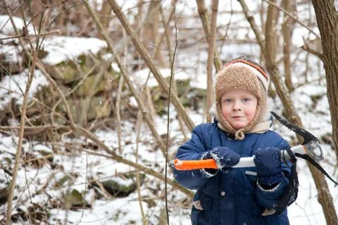 Small boy with ice axe Stock Photos