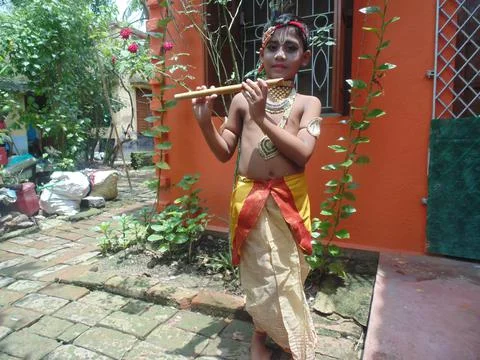 A Small Boy Posing As Little Krishna Stock Photos