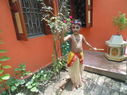 A Small Boy Posing As Little Krishna Stock Photos