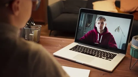 Small boy pupil using laptop computer for remote learning being isolated during Stock Footage 156110321