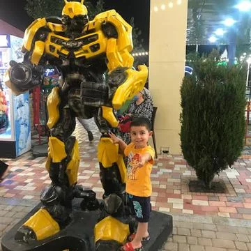 Small boy with robot Stock Photos