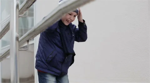 A small boy running and laughing Stock Footage 67170528