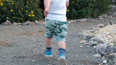 Small boy running on holiday in the sun, 4K Stock Footage 112017451