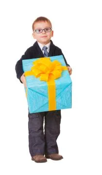 Small boy in spectacles with big present Fotos de archivo