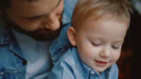 Small boy is spending his time with father. Dad is talking to his little son Video stock 120398328
