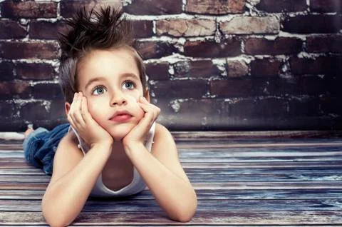 Small boy thinking Stock Photos