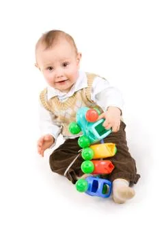 Small boy with toy in hands Stock Photos