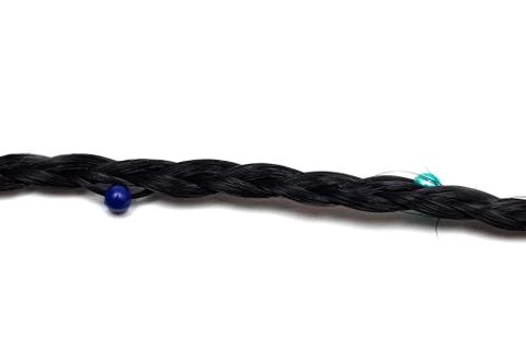 Small braid with beads, isolate on a white background Stock Photos