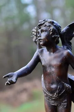 Small brass angel Stock Photos