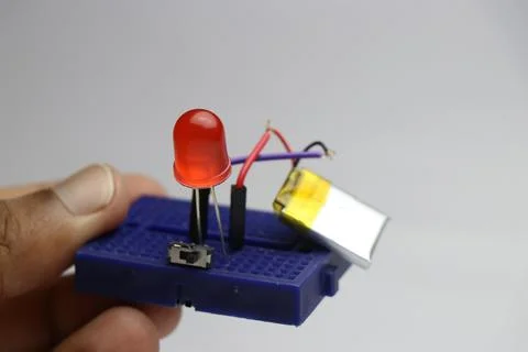 Small breadboard led circuit powered by lithium polymer battery Stock Photos