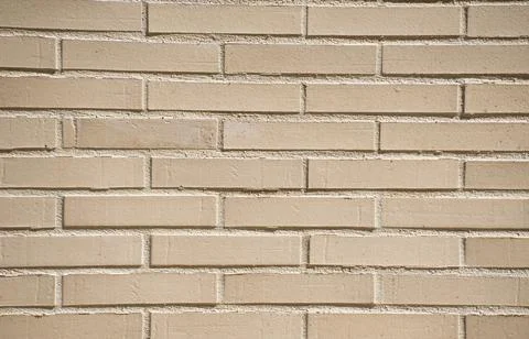 Small brick wall background, brick texture, masonry pattern, construction facade Stock Photos