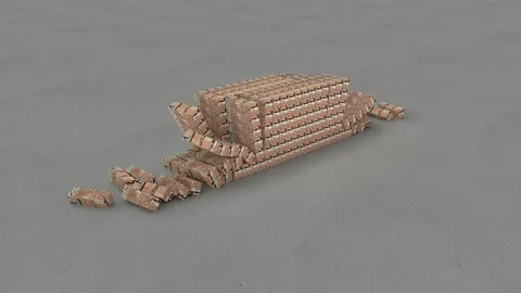 Small Brick Wall Brick Falling Stock Footage 313035128