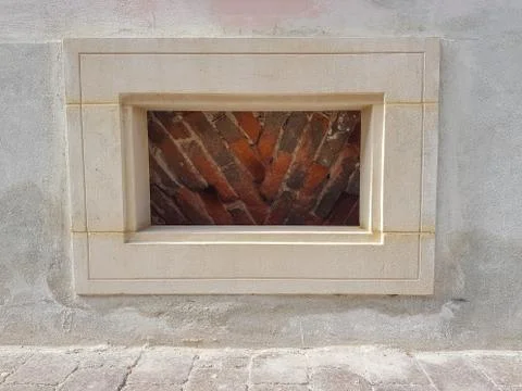 Small bricked window Fotos Stock