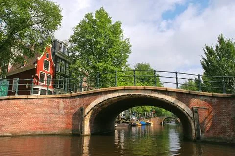 Small bridge in amsterdam. Stock Photos