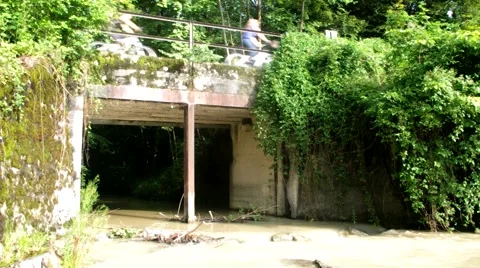 Small bridge over a creek with some bikers 스톡 동영상 40611578