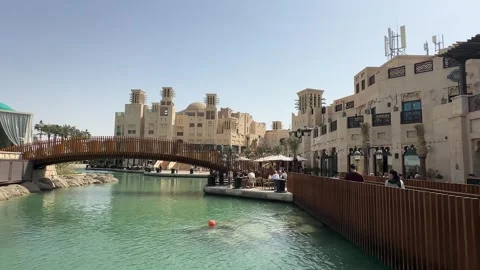 Small Bridge to Restaurant with People Walking, Curved Wooden Bridge in View Stock Footage 303400928
