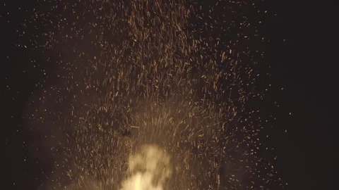 Small Bright Sparks Are Flying From Bonfire At Night Video Stock Footage 266796607