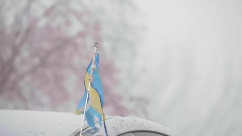 Small broken Sweden flag, Stormy Weather, Politics Democracy and Conflict scene Stock Footage 250086237