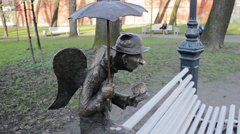 Small Bronze Modern Statue Of Winged Old Dwarf Video stock 64738394