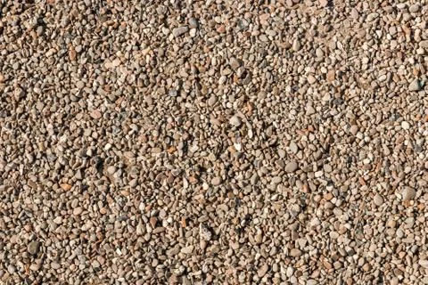Small brown and grey pebble stones for background design Stock Photos