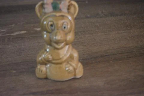 A small brown cat statue Stock Photos