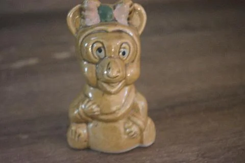 A small brown cat statue Stock Photos