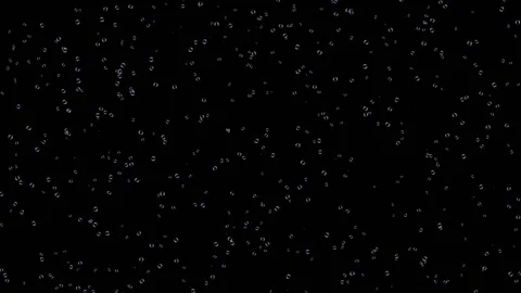 Small bubbles of champagne continuously rise upwards against a black background. 動画素材 153768237