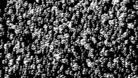 Small bubbles rising in golden liquid Stock Footage 202253155