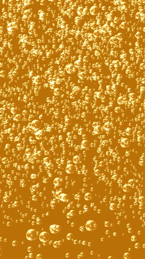 Small bubbles rising in golden liquid Stock Footage 233455627