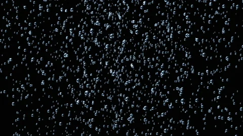 Small bubbles rising in  liquid Stock Footage 180187613