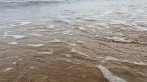 Small Bubbling Waves At The Beach Stock Footage 33890615