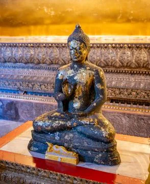 Small Buddha statues inside Wat Pho temple in Bangkok, Thailand, arranged i.. Stock Photos