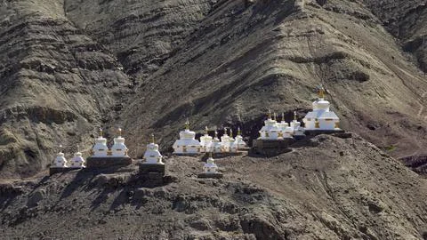 Small Buddhist gompas situated on the mountain near Basgo Monastery, Leh, L.. Stock Photos