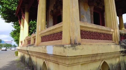 Small budhist temple building next to street Stock Footage 83155943