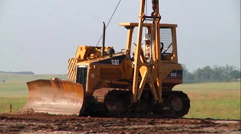 Small bulldozer Leveling Dirt Stock-Footage 44267654