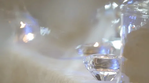 Small burning candle on a blurred background Stock Footage 62379054