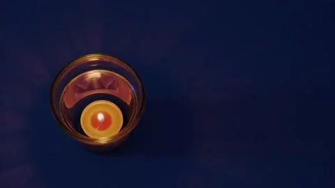 A small burning candle Stock Footage 175219319