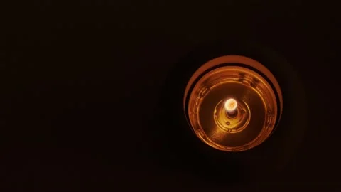 A small burning candle Stock Footage 175239028