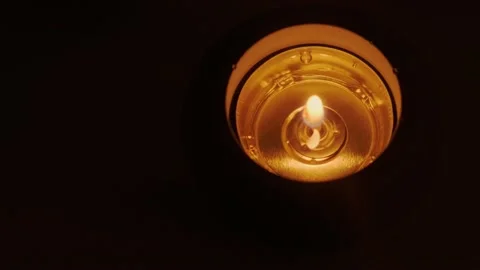 A small burning candle Video stock 175239072
