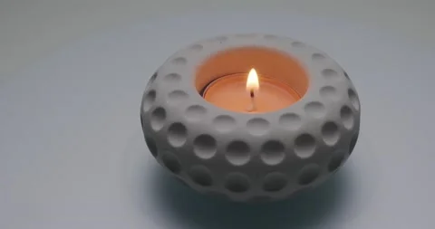 A small burning candle Stock Footage 186732911