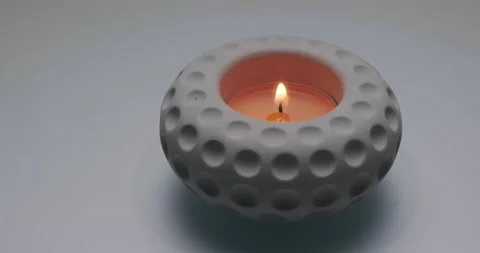 A small burning candle Stock Footage 186733259