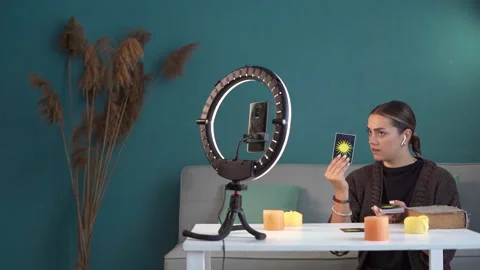 Small business concept. Fortune teller blogger predicts the future using tarot Stock Footage 252600055