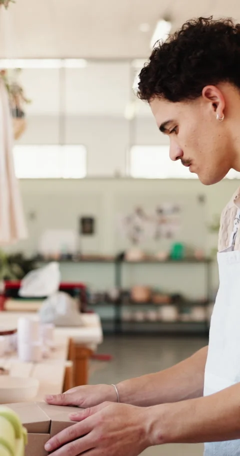 Small business, man and packaging box for ceramic delivery, entrepreneur or Stock Footage 333457306