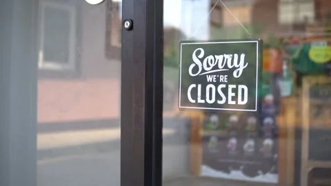 Small business opening up during pandemic. Turning the sign from close to open. Stock Footage