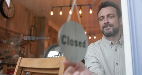 Small business owner opening store Stock Footage 87920587