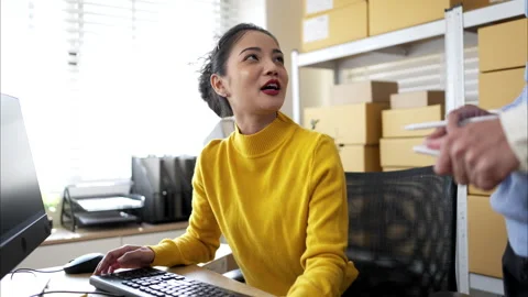 Small business team checking inventory together in warehouse Stock Footage 326271745